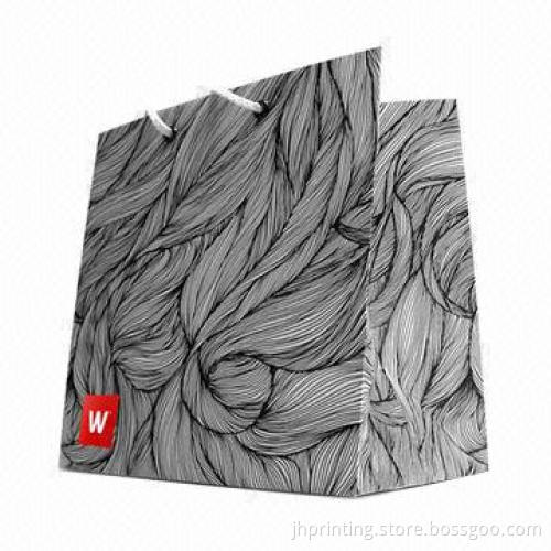 Paper shopping bag, made of 250g art paper or any craft paper and one side coated paper